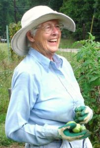 Happy older woman gardening